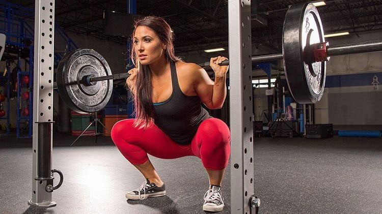 Karina Baymiller training with a barbell.