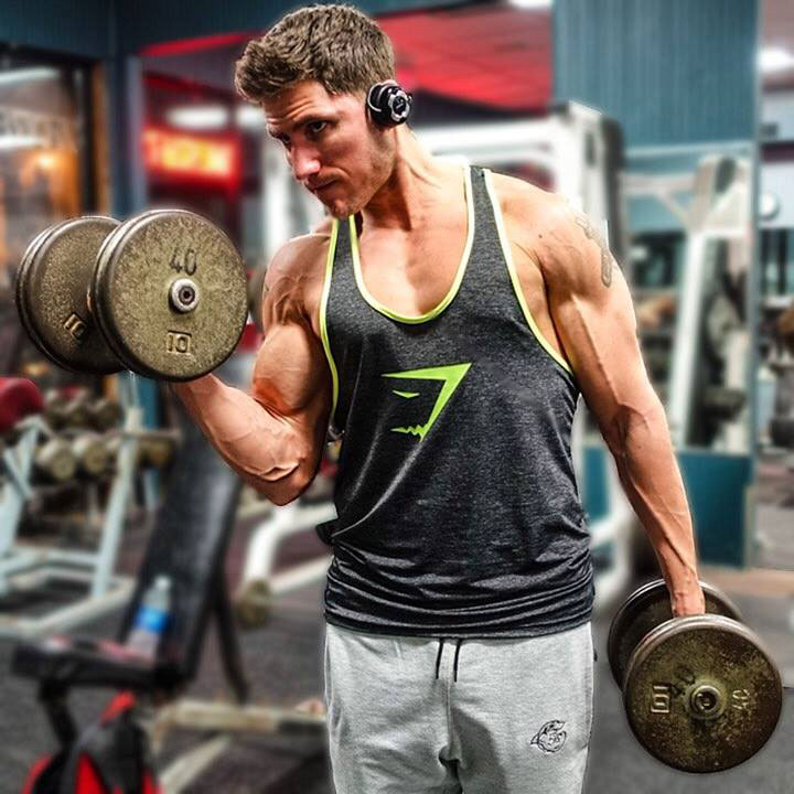 Matty Fusaro performing dumbbell bicep curls.