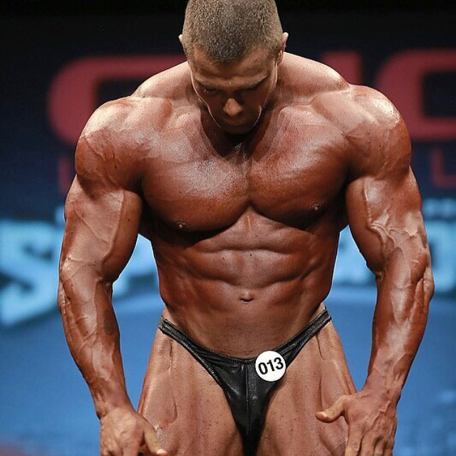 Mike Johnson on the bodybuilding stage.
