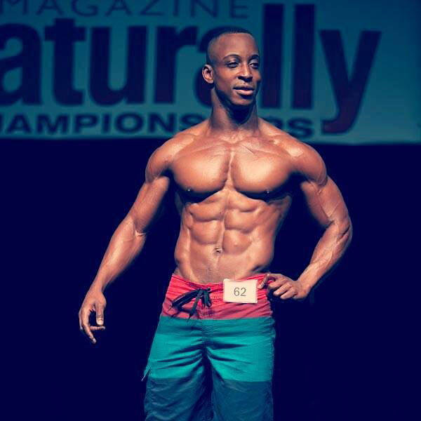 Shaka Smith on the bodybuilding stage.