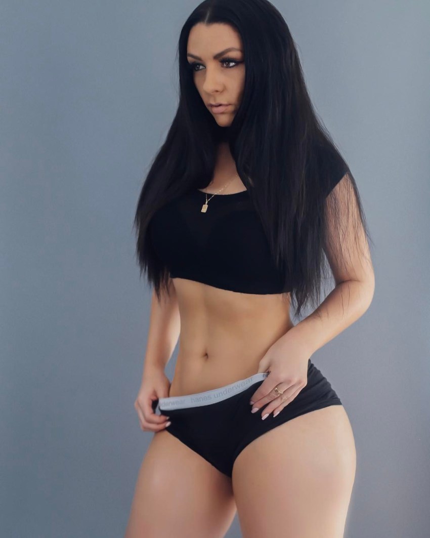 Viktoria Kay posing in a photo shoot looking fit and lean
