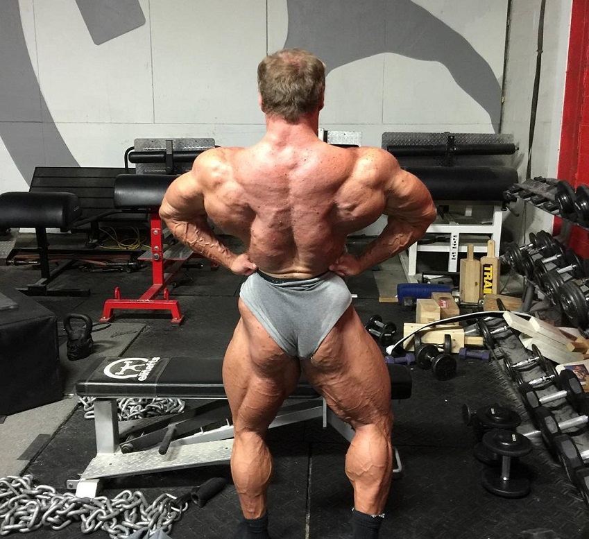 John Meadows showcasting his huge and wide lats for the photo