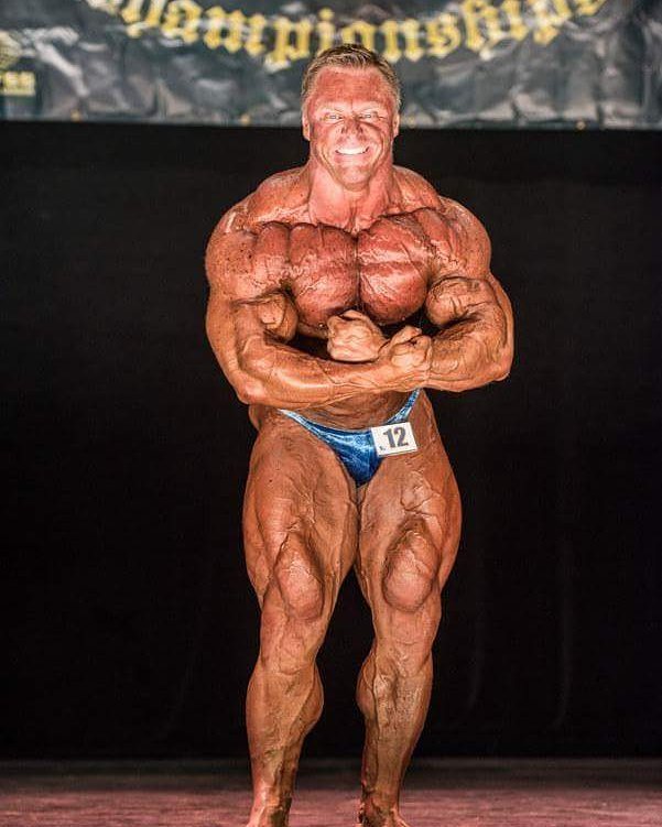 John Meadows flexing most muscular on a bodybuilding stage