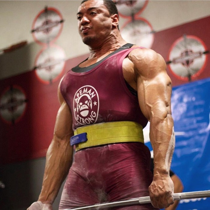 Larry Wheels lifting extremely heavy deadlifts during a powerlifting competition