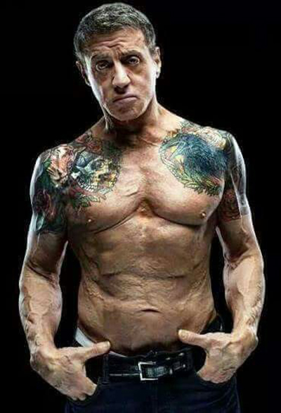 Sylvester Stallone posing topless for a photoshoot looking ripped