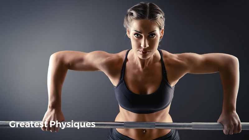 Strong female athlete in sportswear performing a bent over row on a grey background