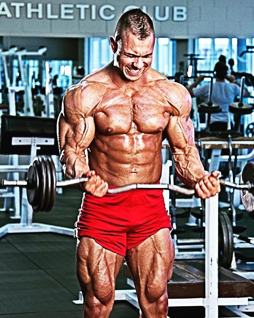 Matt Porter doing heavy biceps barbell curls