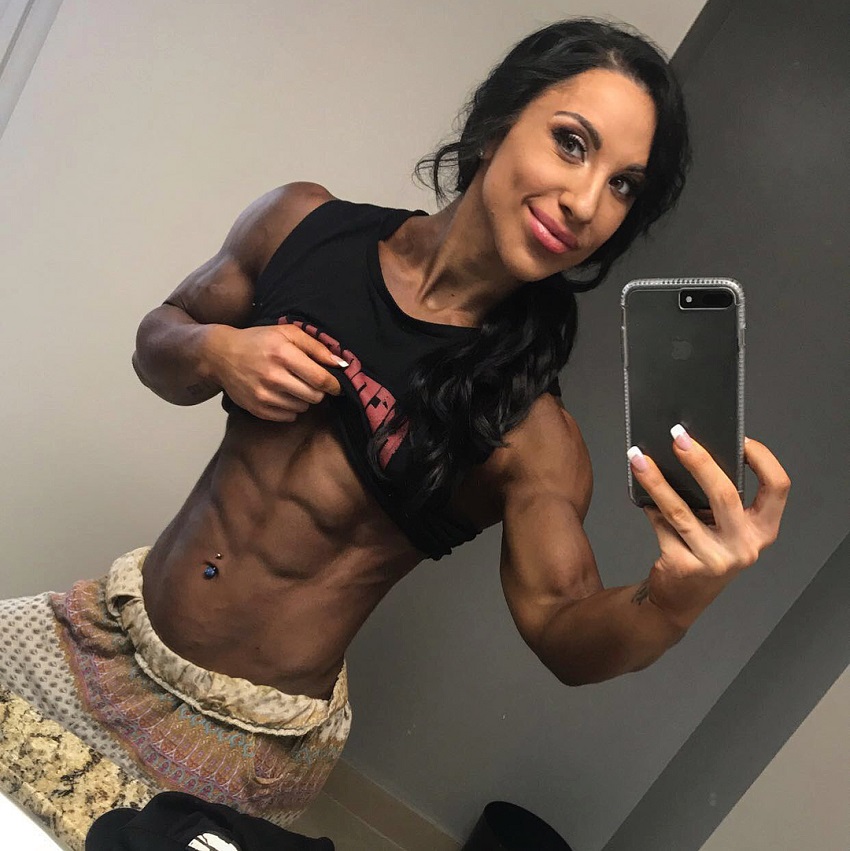 Chloe Sannito taking a selfie of her ripped physique