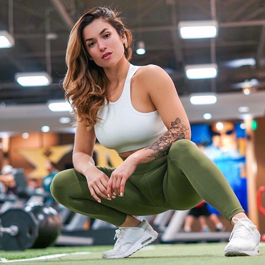 Luciana Del Mar posing in front of a camera wearing sports clothes looking fit and healthy