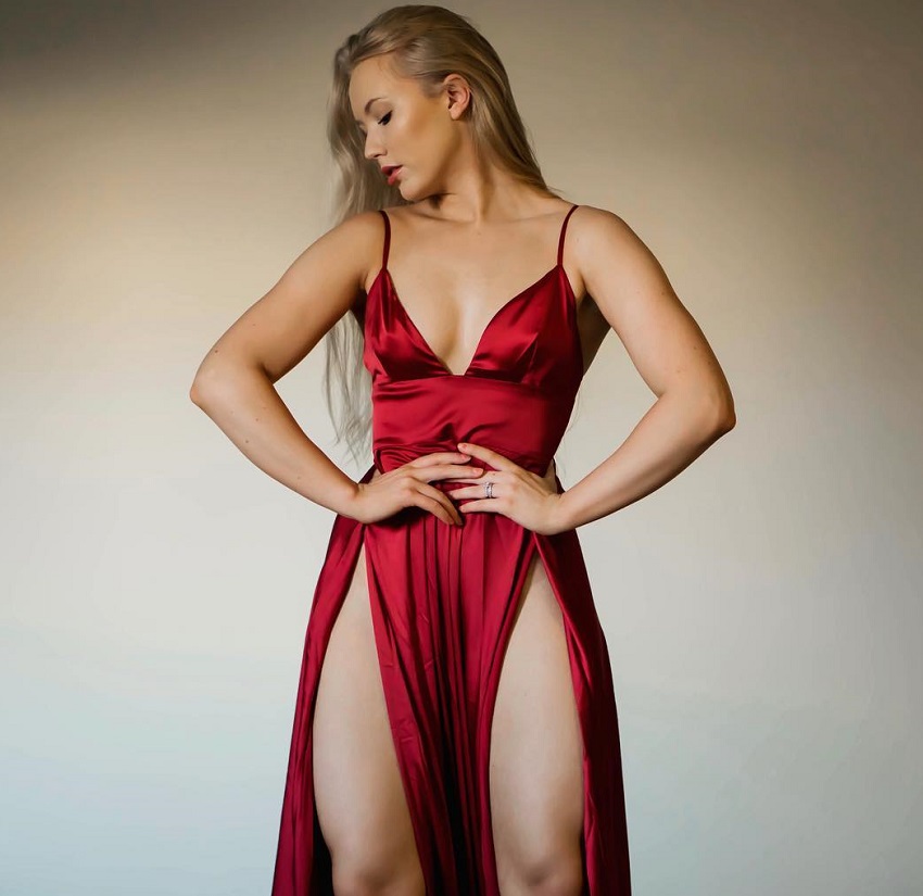 Shae LaShae in a silk red dress looking healthy and fit.