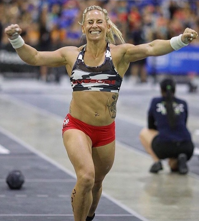 Cassidy Lance-Mcwherter running any smiling during a CrossFit contest, happy with her result