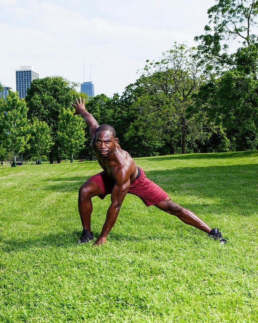 Gideon Akande training outdoors on the grass