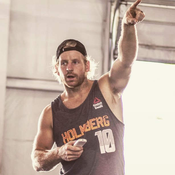 Graham Holmberg instructing his students during a CrossFit training session