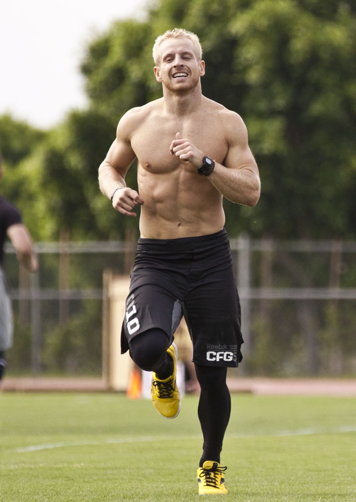 Graham Holmberg running outdoors looking fit and lean