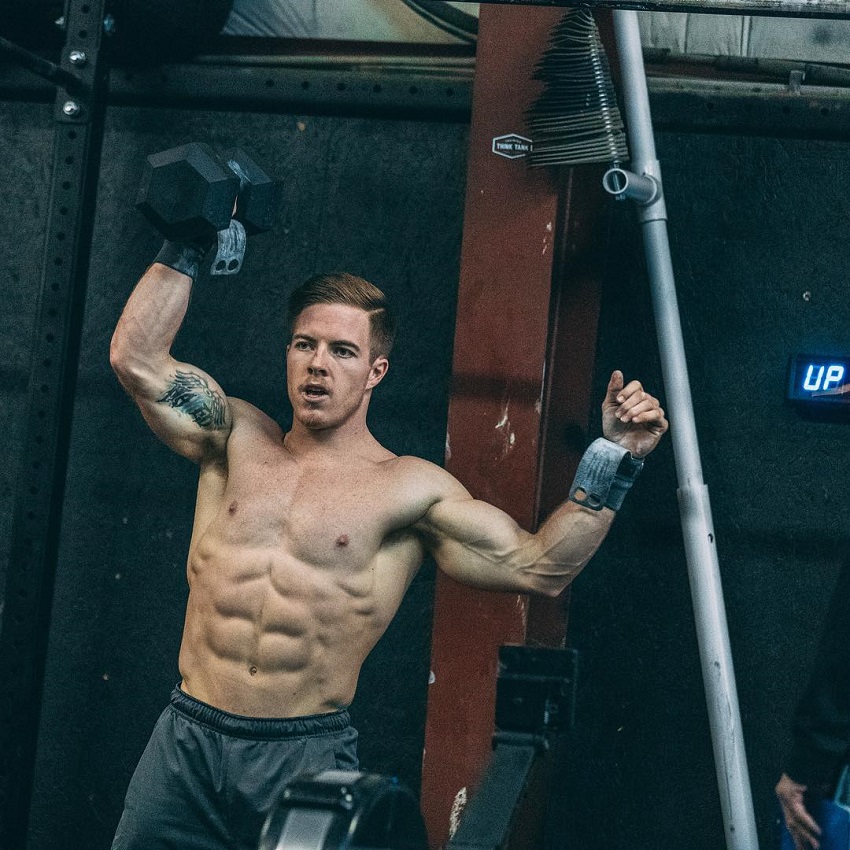 Noah Ohlsen lifting kettlebells during CrossFit training