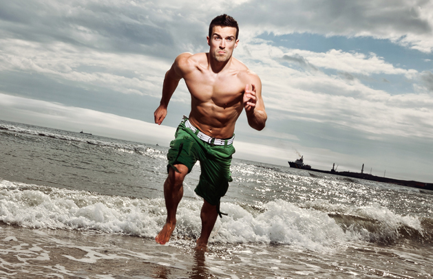 Scott Baptie running on the beach