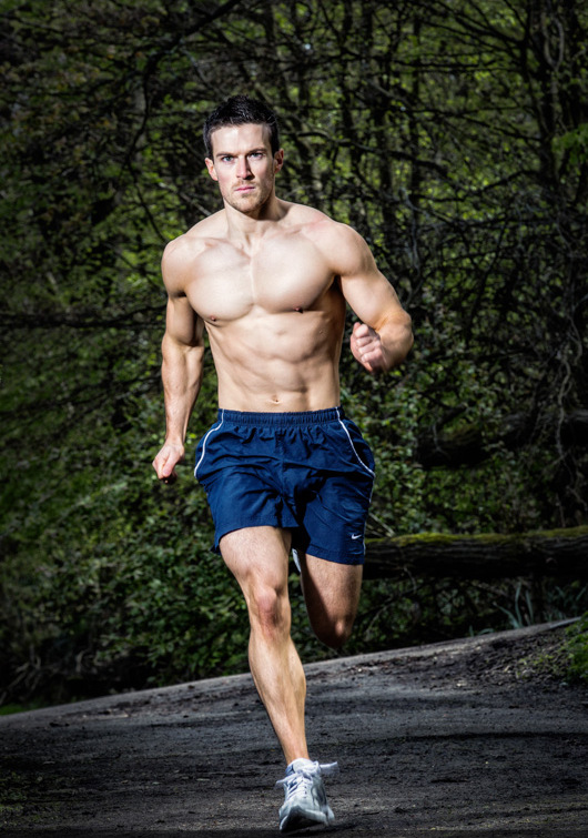 Scott Baptie running shirtless outdoors looking fit and lean