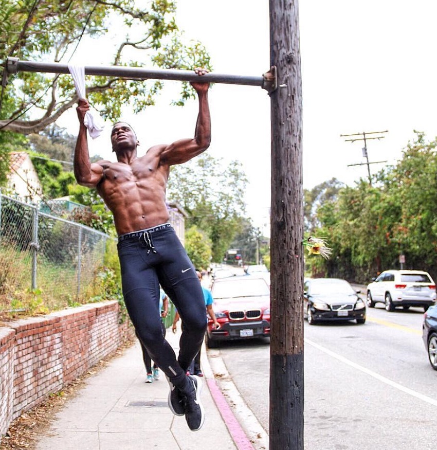 Joe Holder doing pull ups on the street