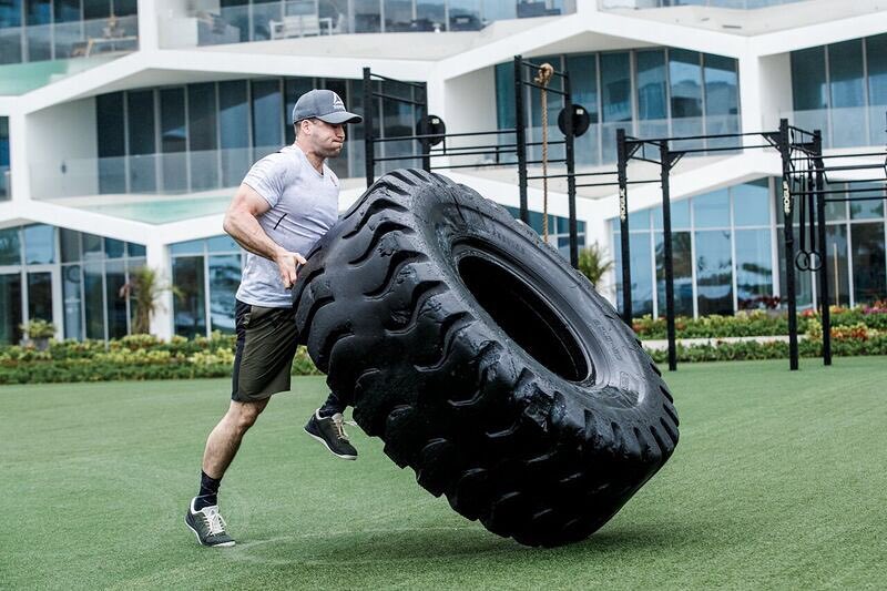 Ben Smith flipping a big and heavy tire