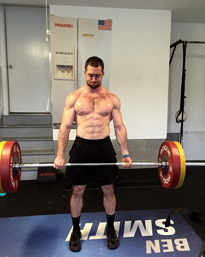 Ben Smith lifting a heavy barbell while being shirtless