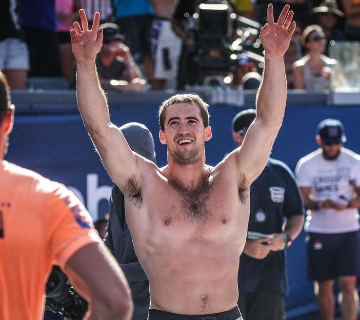 Ben Smith waving at the crowd during a CrossFit competition