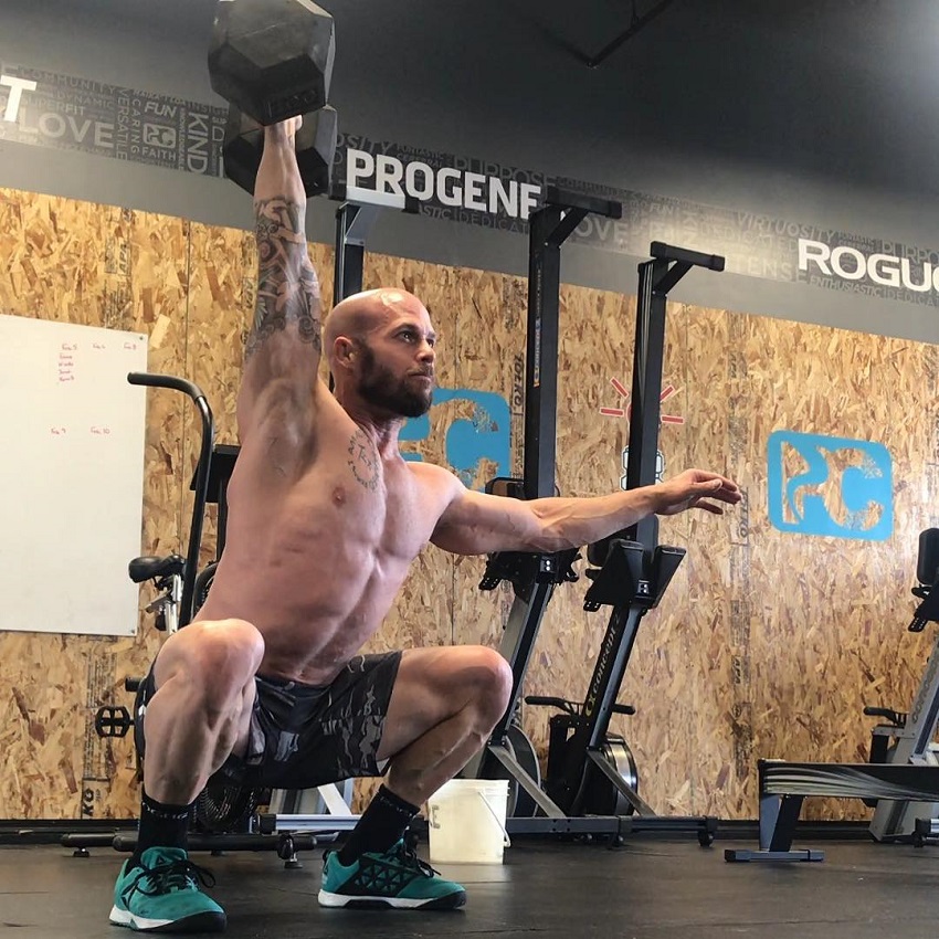 Chris Spealler doing an overhead dummbell press