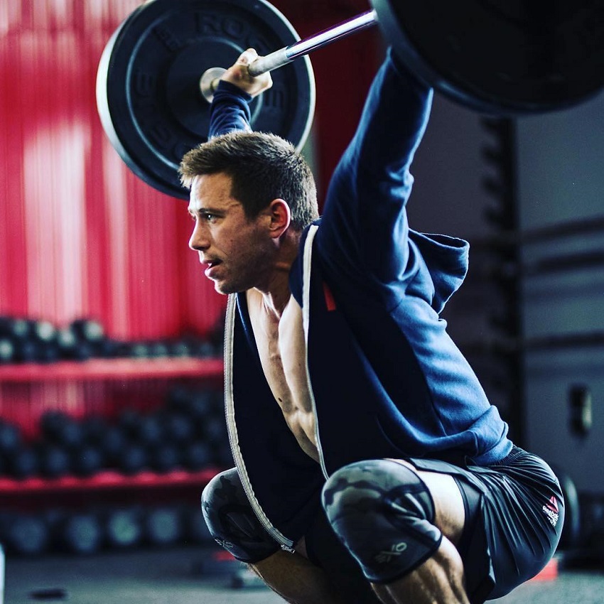 Dan Bailey doing an overhead exercise