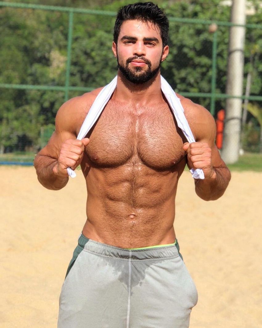 Jefferson Ferreira standing shirtless with a white towel around his neck