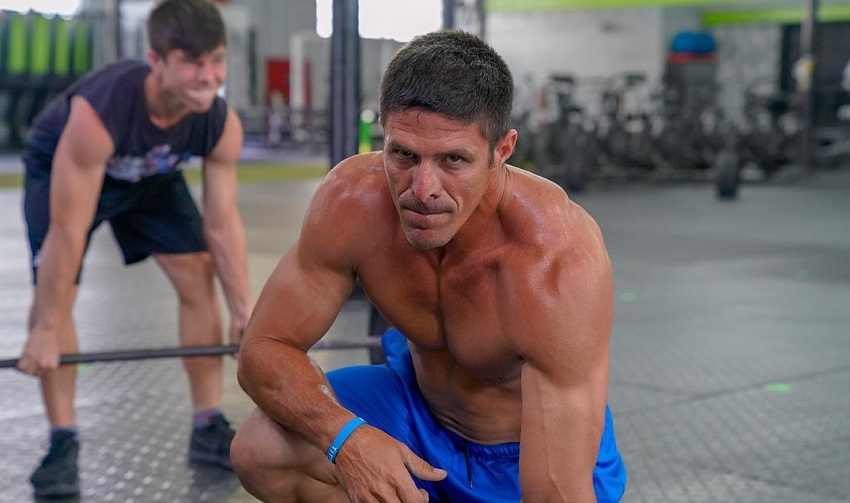 Shawn Ramirez posing shirtless for a photo looking strong and fit