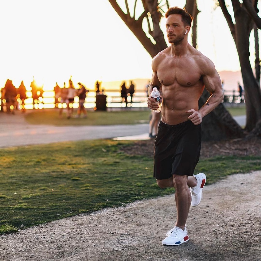 Daniel Fox running shirtless outdoors