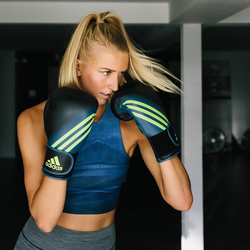 Zanna Van Dijk wearing boxing gloves practicing boxing