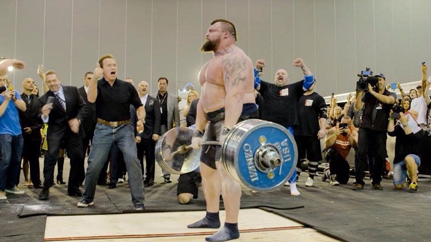 Eddie Hall doing heavy deadlifts during a strongman competition