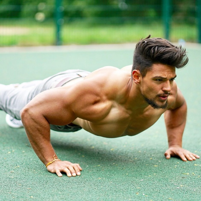 Jamar Pusch doing push-ups shirtless