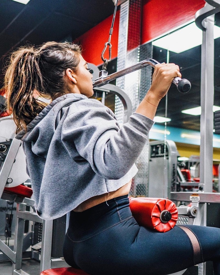 Laura Micetich performing cable lat pull-downs