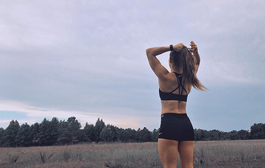 Mattie Rogers standing outdoors in nature looking healthy and fit