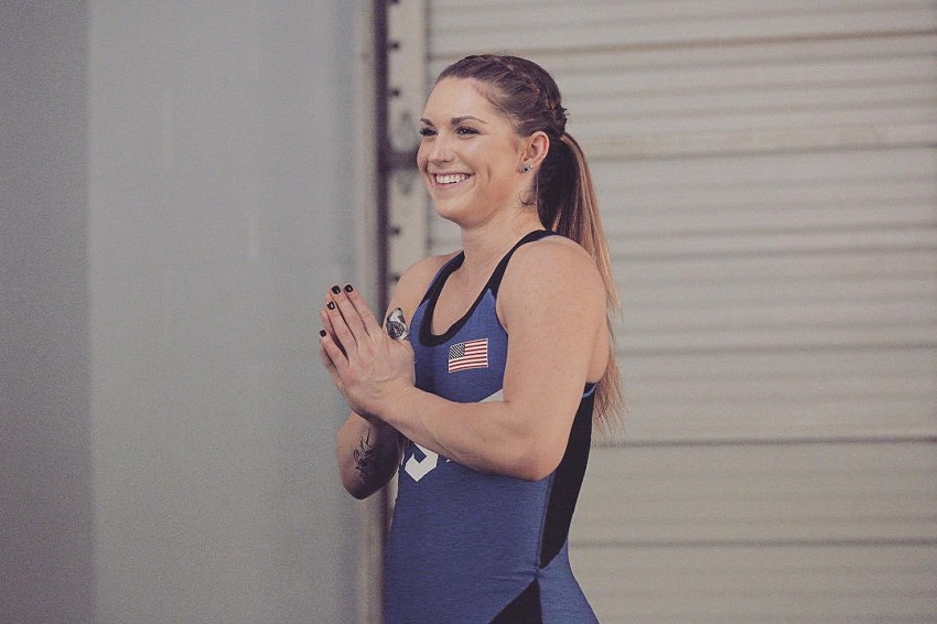 Mattie Rogers smiling during a weightlifting contest