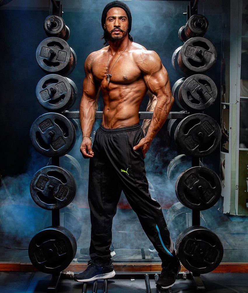 Thakur Anoop Singh posing for the photo looking ripped and strong