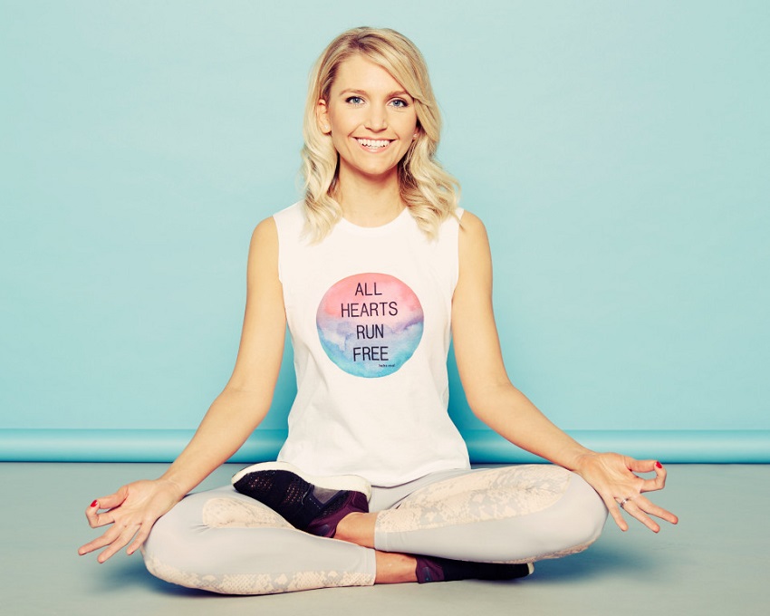 Faya Nilsson sitting in a lotus pose looking healthy and fit