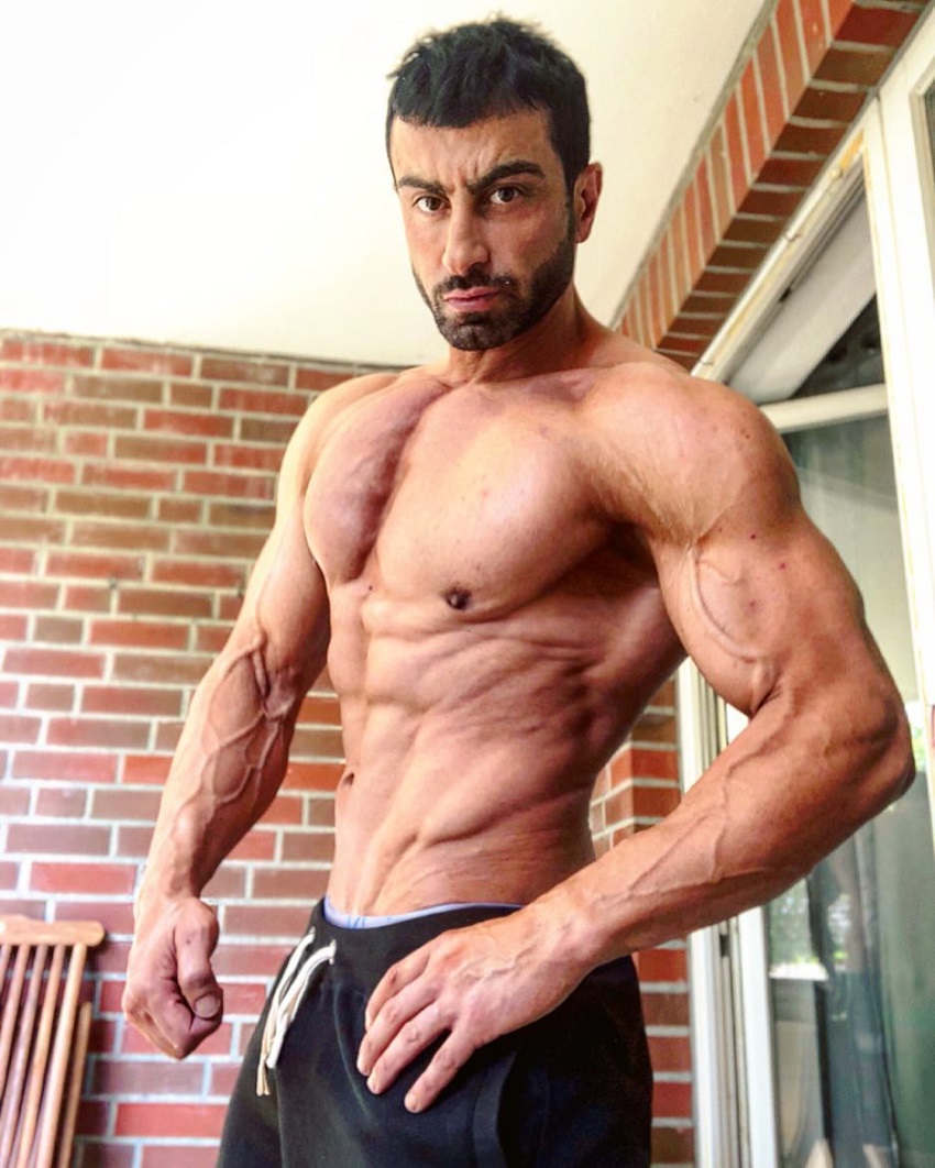 Murat Demir posing shirtless for a photo