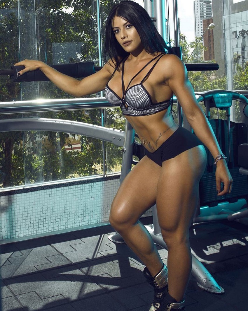 Yasmin Castrillon standing in a gym during a professional photo shoot