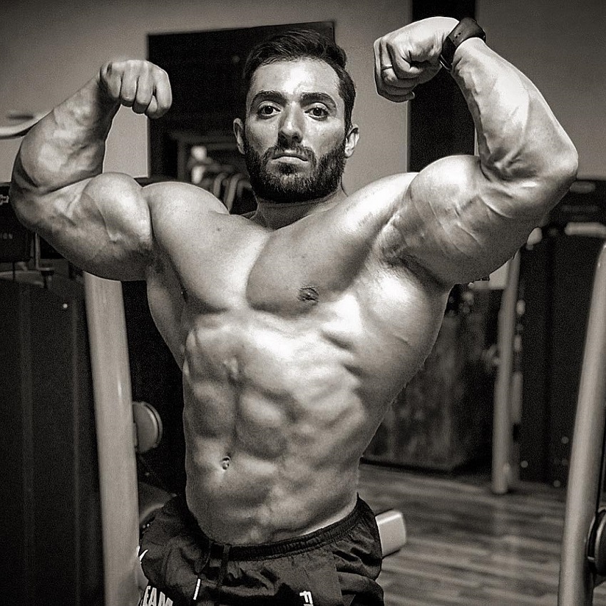 Abtin Shekarabi performing a front double biceps flex