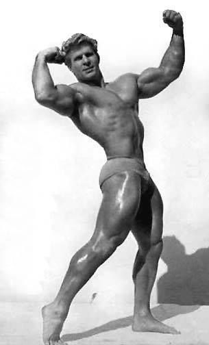 Jack Delinger performing a bodybuilder's pose for a photo