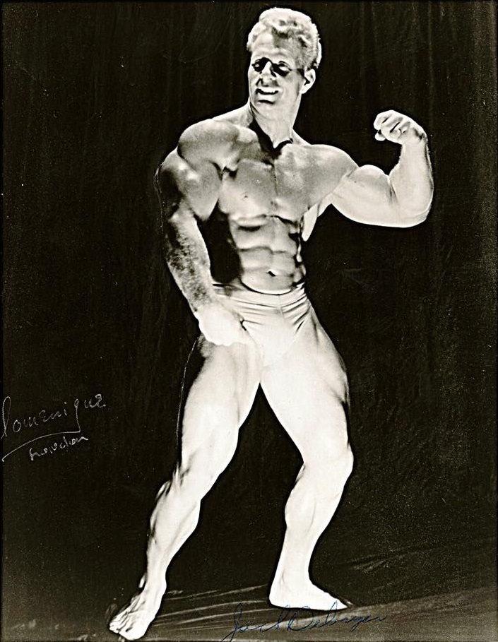 Jack Delinger posing in a bodybuilding competition