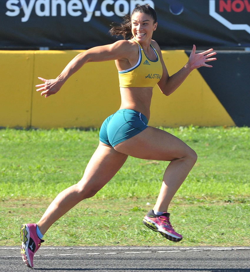 Michelle Jenneke running and smiling