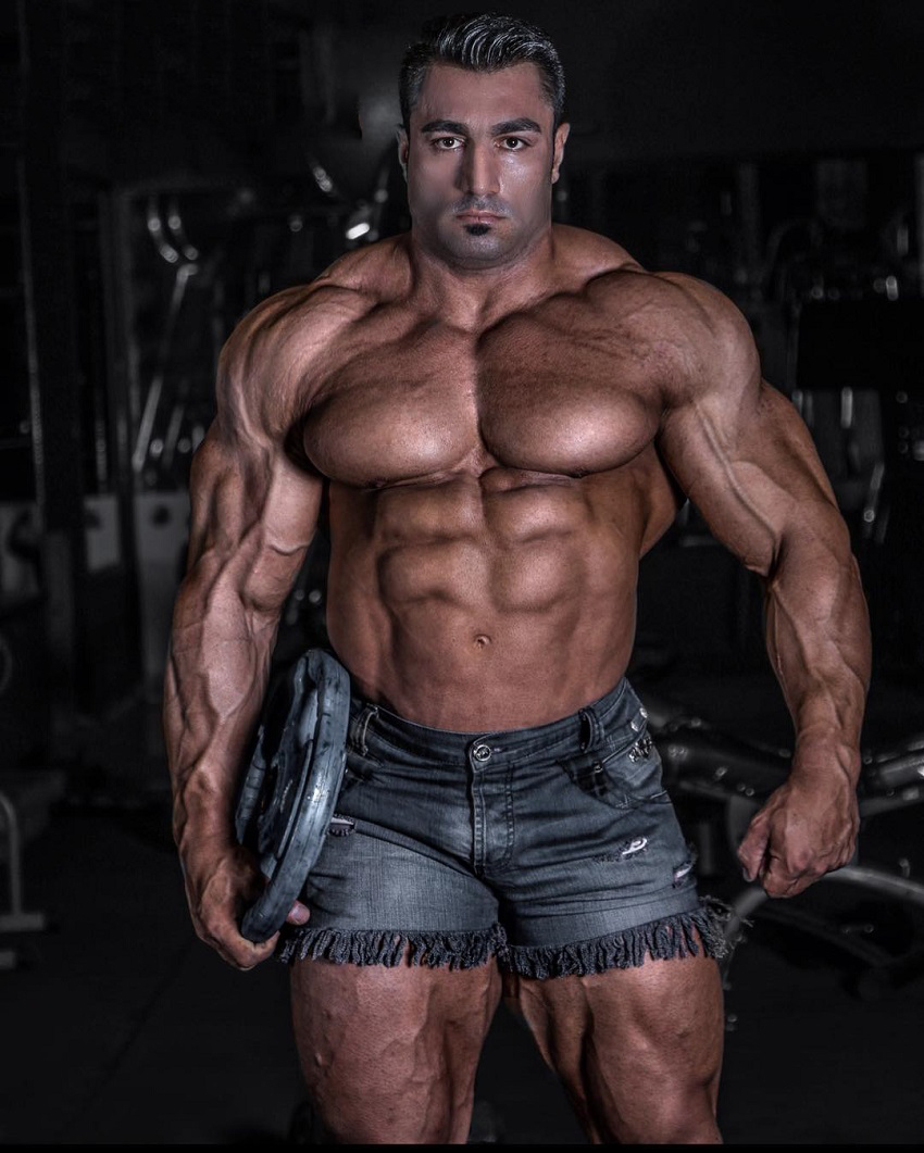 Rouhollah Mirhoseini showing off his ripped body in a photo shoot