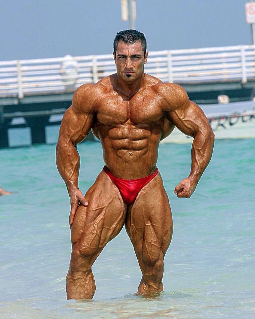 Rouhollah Mirhoseini standing in the sea looking vascular and ripped