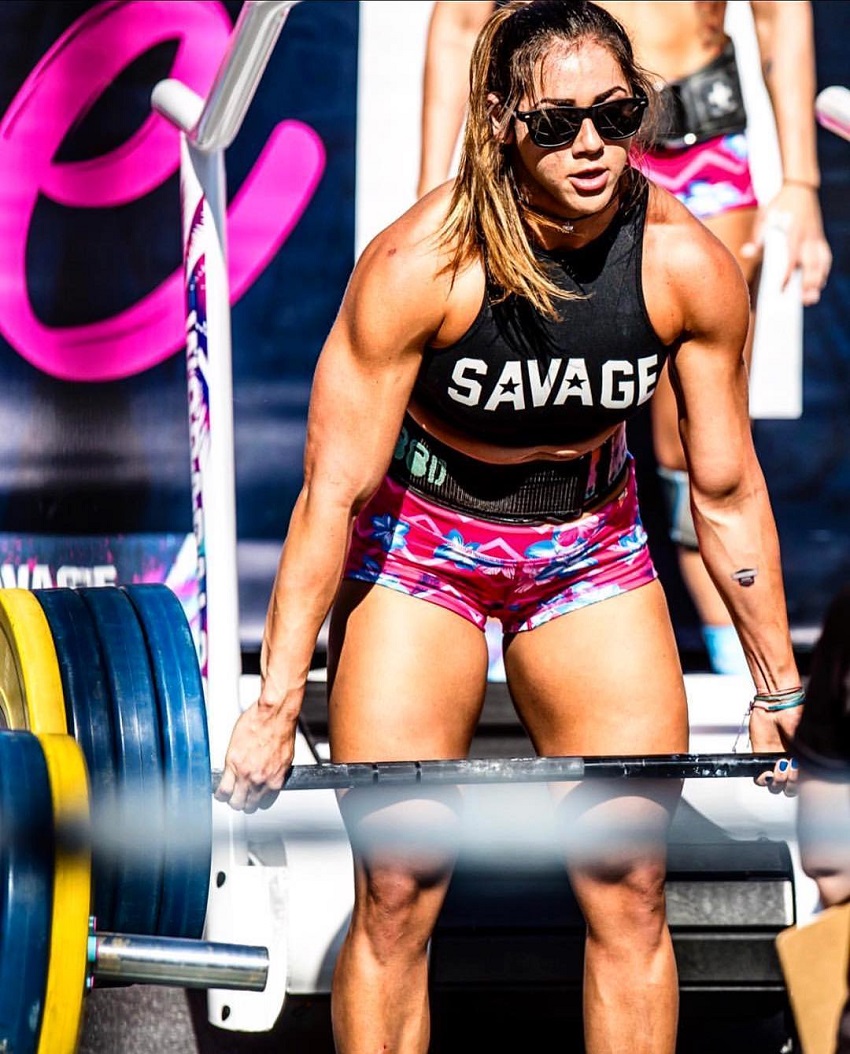 Cristina Bayardelle competing during a CrossFit Event, lifting heavy weights