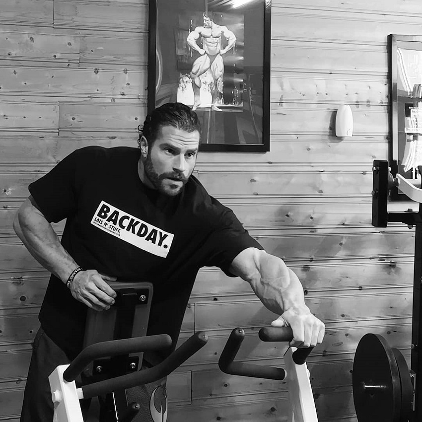 David Hoffmann training his lats on a machine