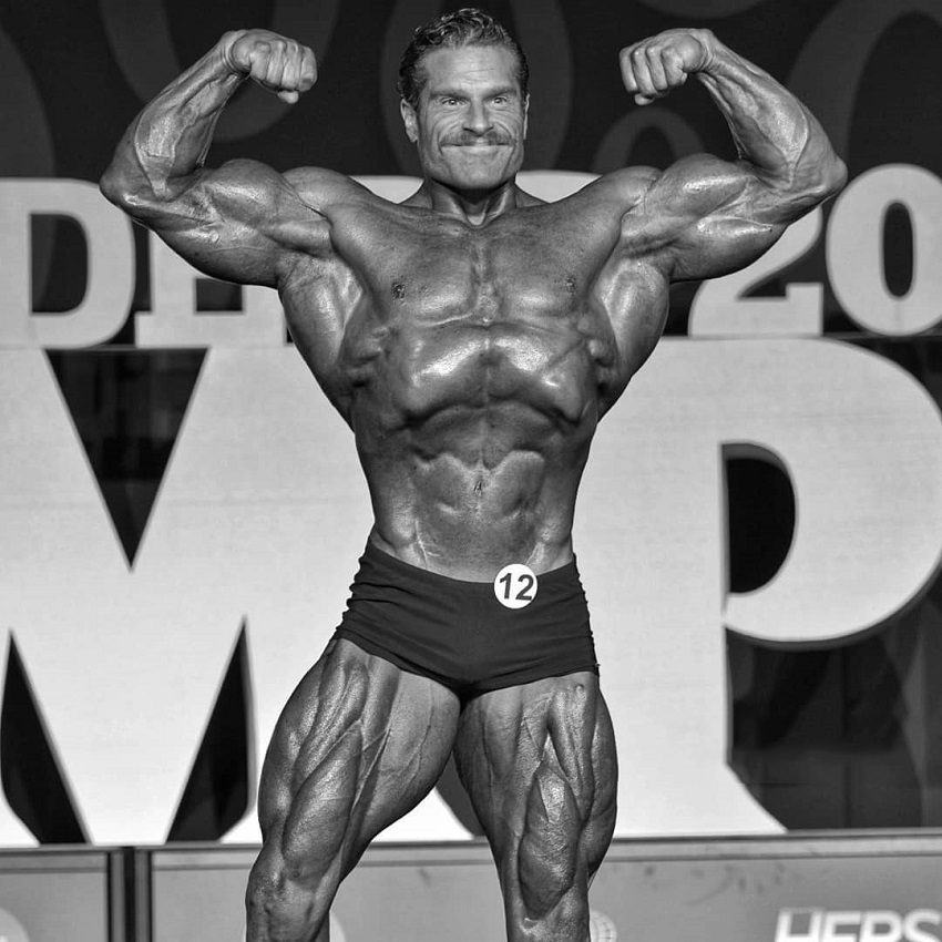 David Hoffmann flexing on the Mr. Olympia stage