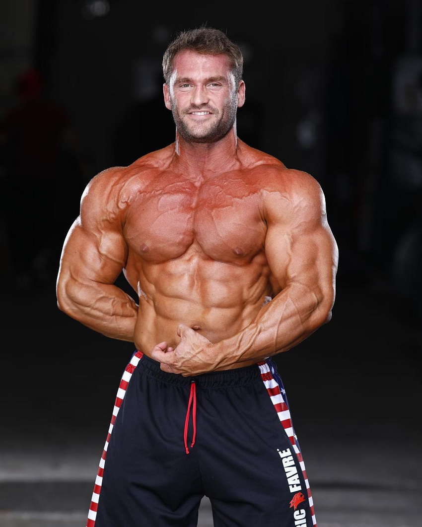 Stanimal De Longeaux flexing his swole and ripped muscles for a photo